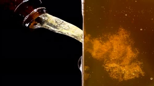 Beer Pouring Into Glass Close-Up Detail