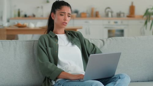 Sad Frustrated Indian Woman at Home Using Laptop Mobile Phone Upset Online Shopping Problem Tired