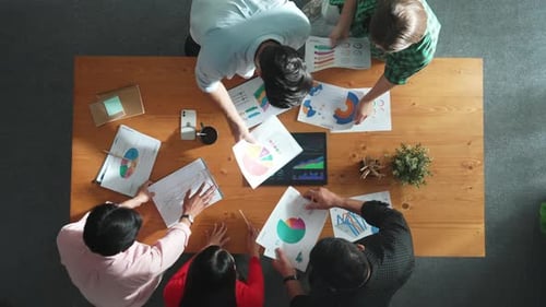 Top view of business people brainstorming and planning strategy. Convocation.