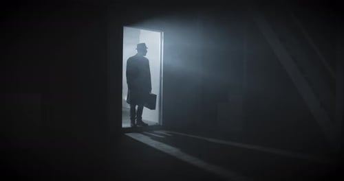 Mysterious Silhouette in Dark Room with Doorway