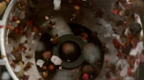 Close-Up of Pepper, Salt and Spices in Grinder