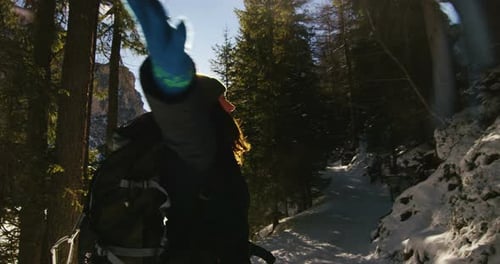 in the mountains a girl breathes in the woods pure and fresh air. Free and open spaces, places of