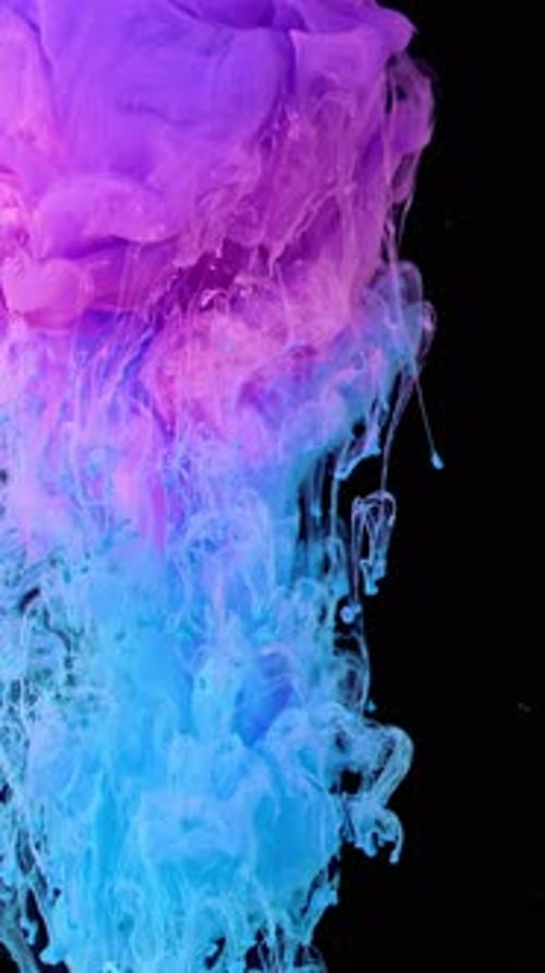 Abstract Pink and Blue Ink Swirls Flowing Downward