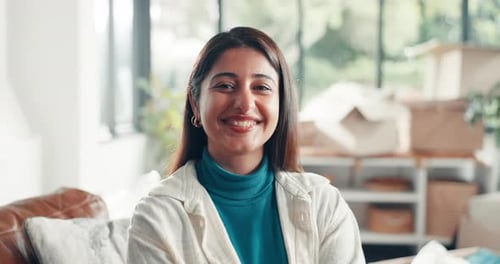 Face, new home and woman on couch, boxes and real estate with mortgage, relax and relocation