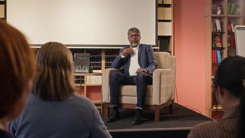 Author Talks About His New Book in Meeting