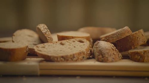 Sliced Multigrain Bread on Wood Cutting Board
