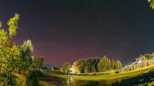 Night Sky Time-Lapse over a Rural Pond