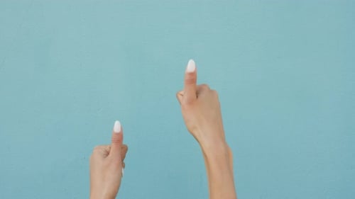 Sign, hands and thumbs up or thank you gesture, good job or well done over blue studio background