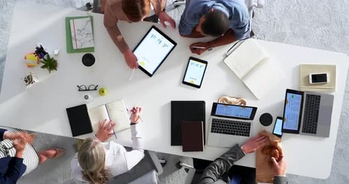 Technology, planning and business people in a meeting at the office in collaboration for company