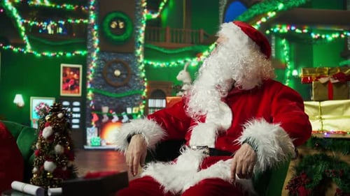 Santa Receiving a Gift in Cozy Christmas Setting