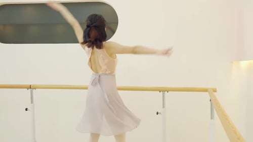 Woman Practicing Ballet Dancing in a Studio