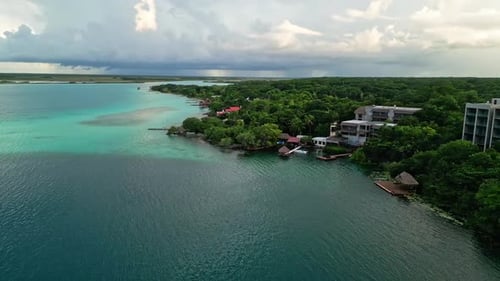 Lakefront Hotel Accommodations At Bacalar Lagoon In Quintana Roo, Mexico. Aerial Drone Shot