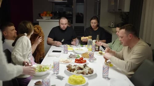 Joyful Family Gathering Eating Meal Together Indoors