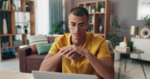 Businessman, talking or video call with laptop for communication or online meeting at home office