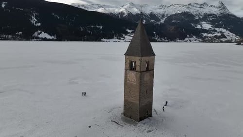 View from above of the ancient bell tower of Curon Venosta on Lake Resia