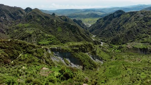 Flying Over The Green Mountain Peaks