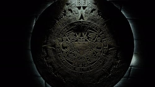 Intricate Stone Carving Illuminated in Dark Tunnel