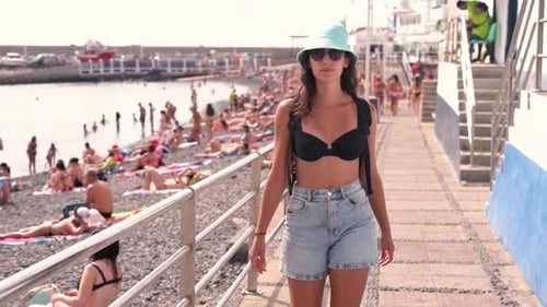 Tourist woman visist city urban sightseeing by girl front view