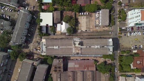 Asian labor camp. Dramatic aerial view flight
Bangkok District ari, thailand 2022. vertical bird's