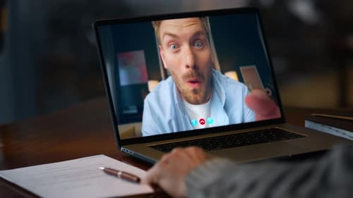 Excited Worker Speaking Laptop Video Call at Night Office Closeup Guy Gesturing