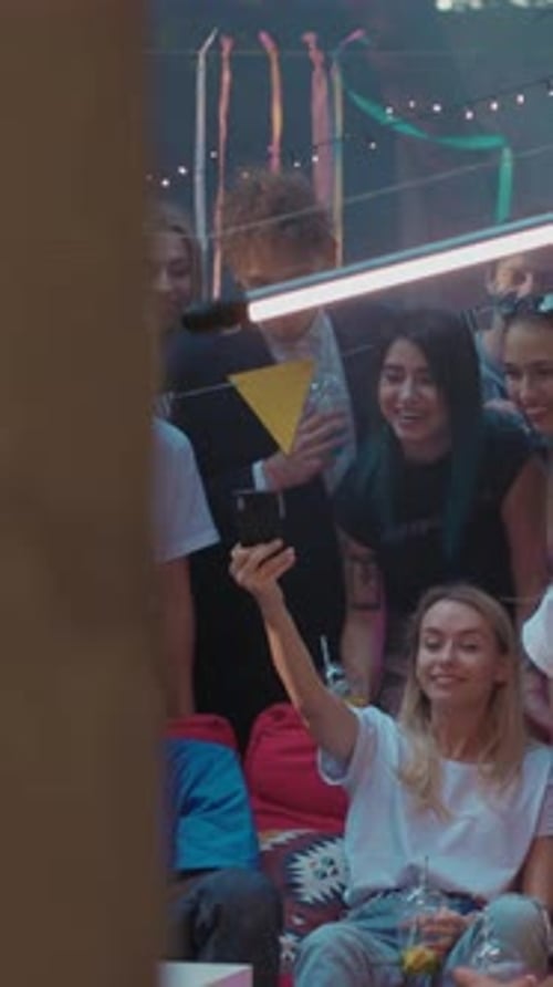 Young Adults Celebrate Together, Taking Group Selfie