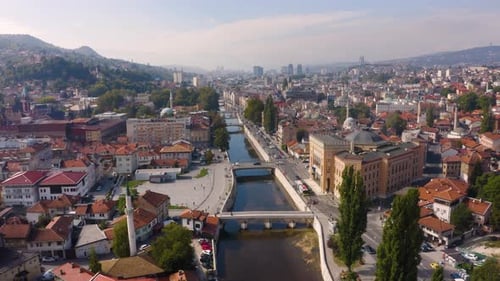 Aerial View of Cityscape with River and Bridges