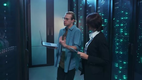 Data Center Engineers Working on Servers
