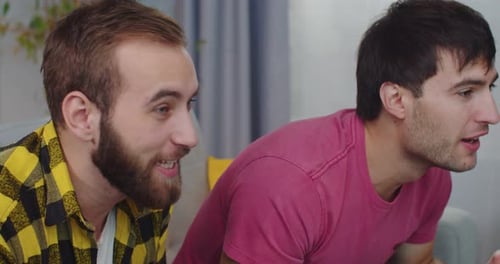 Happy Emotional Men Screaming Cheering for Favorite Soccer Team Watching Television Sport Channel