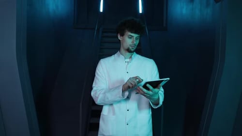 Scientist Using Tablet in a Futuristic Lab