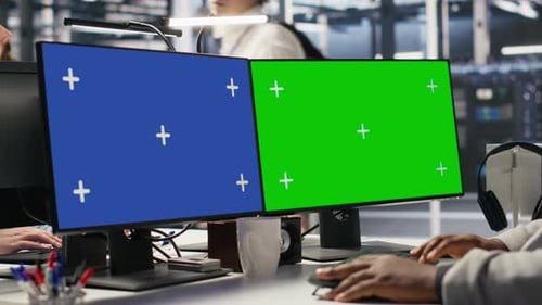 Data Center Engineer Using Green Screen PC to Monitor Neural Network AI