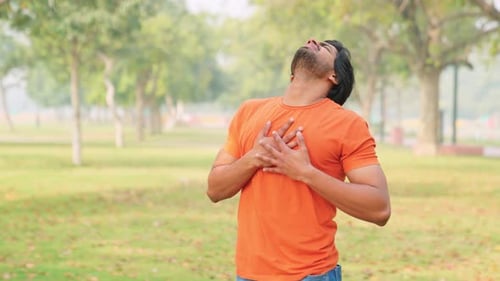 Young Indian Man Having Chest Pain
