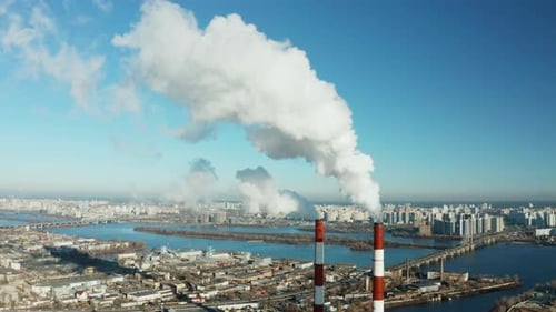 Pollution of the environment: a pipe with smoke. Power Plant.