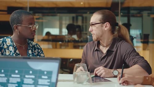 Diverse Team Meeting in Modern Office Workplace