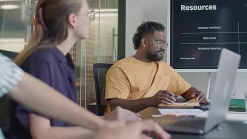 Multi-Ethnic Business Team Discussing Plans on Office Meeting