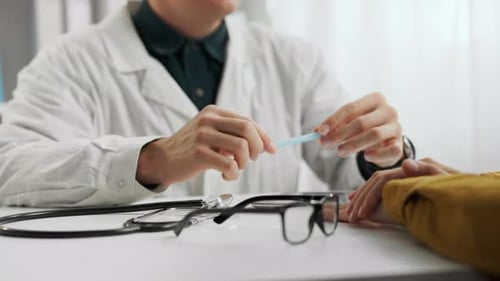 Doctor Explains Diagnosis to Patient in Modern Clinic