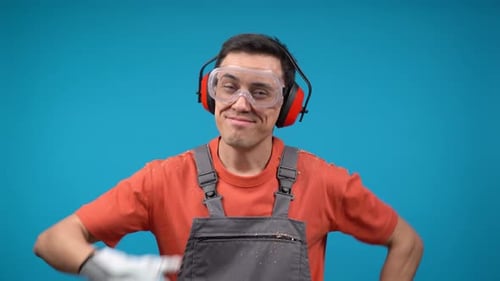 Smiling Construction Worker Gives Thumbs Up