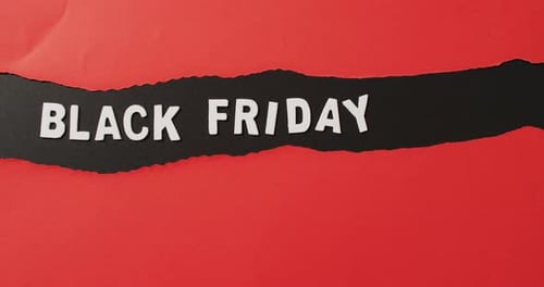 Bold Black Friday Text Reveal on Red Background