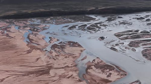 Aerial View of Braided River System in Volcanic Icelandic Landscape