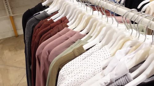 Stylish Clothing Rack Featuring a Wide Variety of Shirts and Blouses for Fashion Lovers