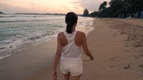 Young Woman Walking on Beach Near Sea, Super 240