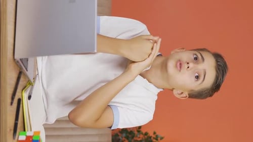Teen Talks at Computer in Vertical Video
