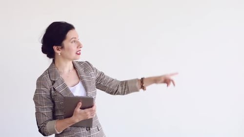 Professional Woman Presenting with Tablet