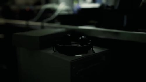 Pair of Sunglasses Resting on Table Surface