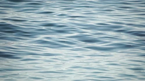 Sea Water Surface Low Angle View Over Clear Azure Sea Water Sun Glare Abstract Nautical Summer Ocean