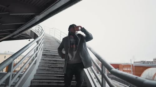Fulllength Portrait of Black Man in Urban City View Walking Down Stairs African American Male Person
