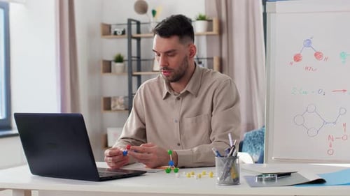 Distance Education, School and Remote Job Concept - Male Chemistry Teacher With