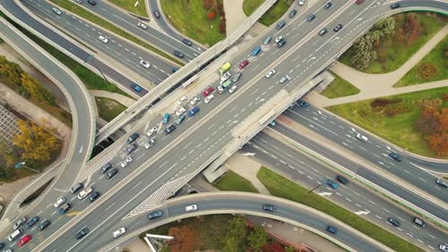 Aerial shot of elevated road junction. Drone footage of top view of Highway road junctions. The Inte