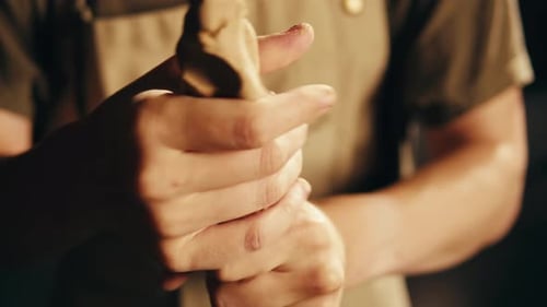 Man Potter Works with Clay on Master Class in Studio Working Process in Ceramic Workshop Potter