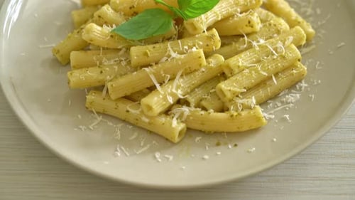 Close-up of Pasta with Pesto and Cheese