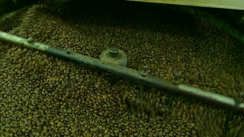 Coffee Beans Being Roasted in Roasting Machine